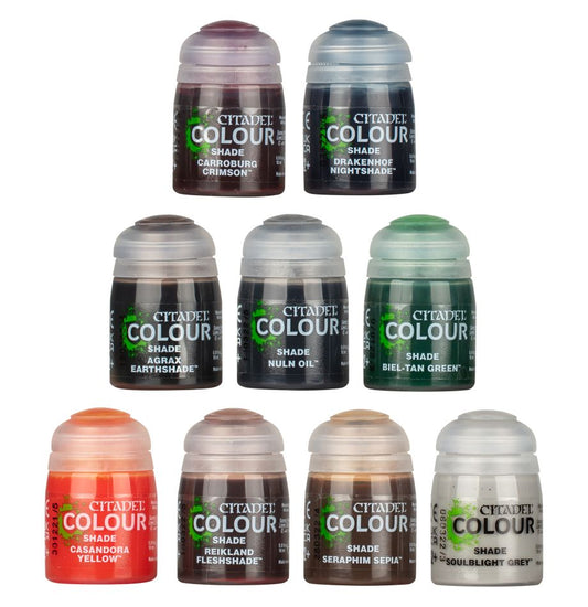 Collection of Citadel Colour shade paint bottles on a white background